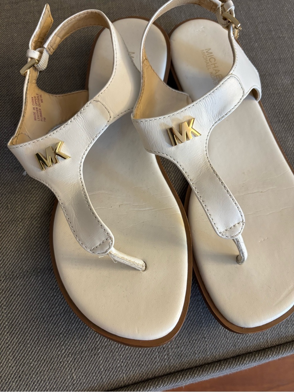 Michael Kors White Leather T-Strap Sandals with Gold MK Accents